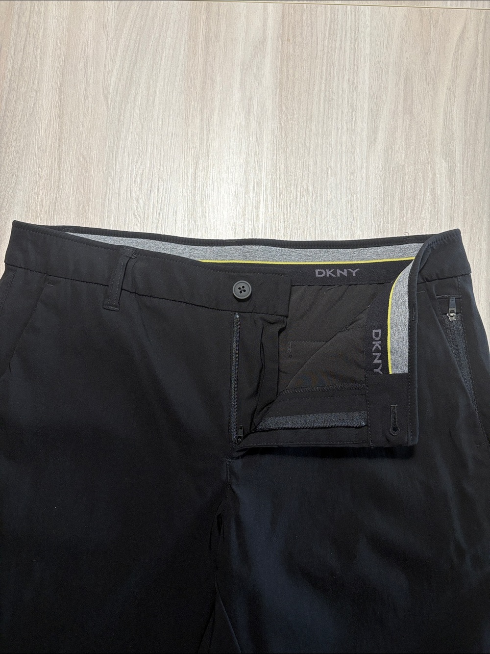 DKNY Men's Black Dress Pants with Subtle Yellow Waistband Accent